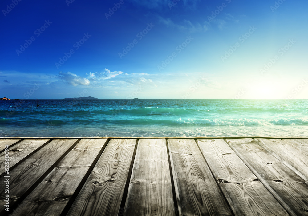 Seychelles beach and wooden pier