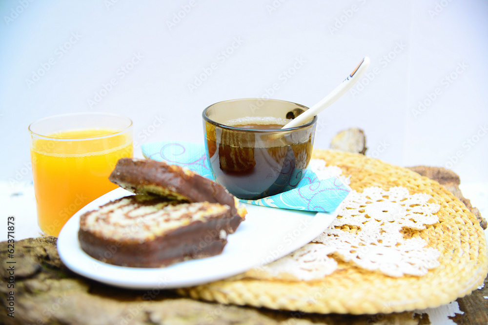Black coffee, chocolate cake and orange juice Black coffee, chocolate cake and orange juice