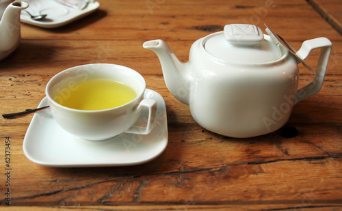 white tea set on wooden table