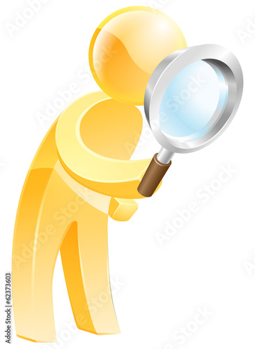 Magnifying glass gold person