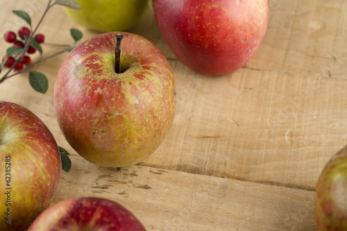 Real Apples, on wooden background