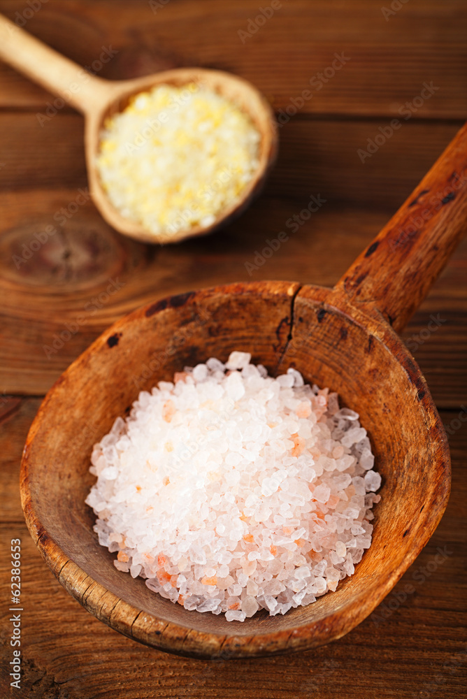Himalayan Pink Crystal Rock salt in rustic wooden spoon Himalayan Pink Crystal Rock salt in rustic wooden spoon