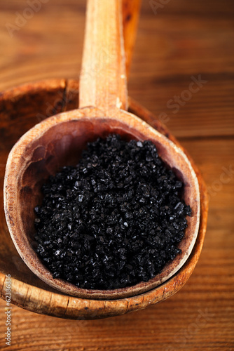 Hawaiian Black lava sea salt in rustic wooden spoon