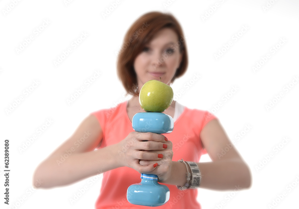 woman holding gym weight and apple healthy nutrition concept woman holding gym weight and apple healthy nutrition concept