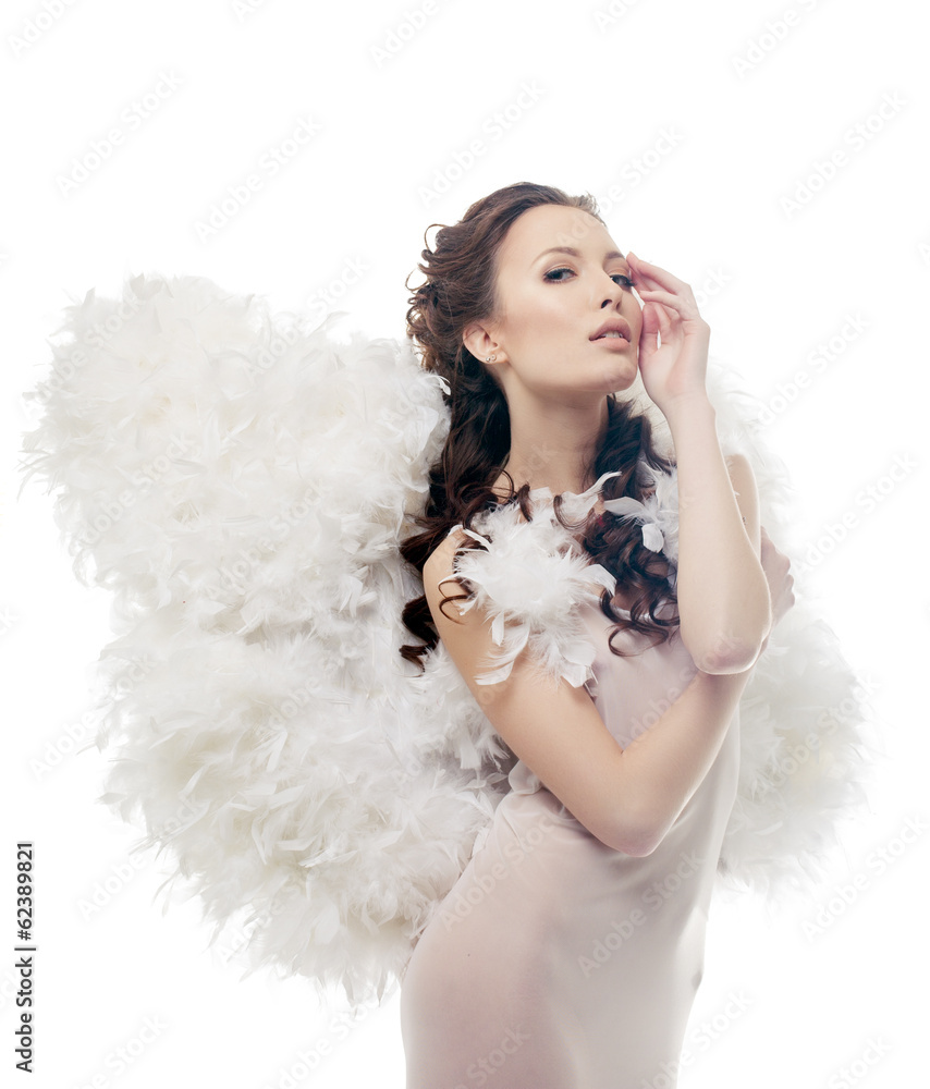 Charming sensual girl posing as angel, close-up Charming sensual girl posing as angel, close-up