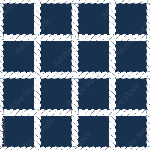 White rope lattice on navy blue geometric seamless pattern