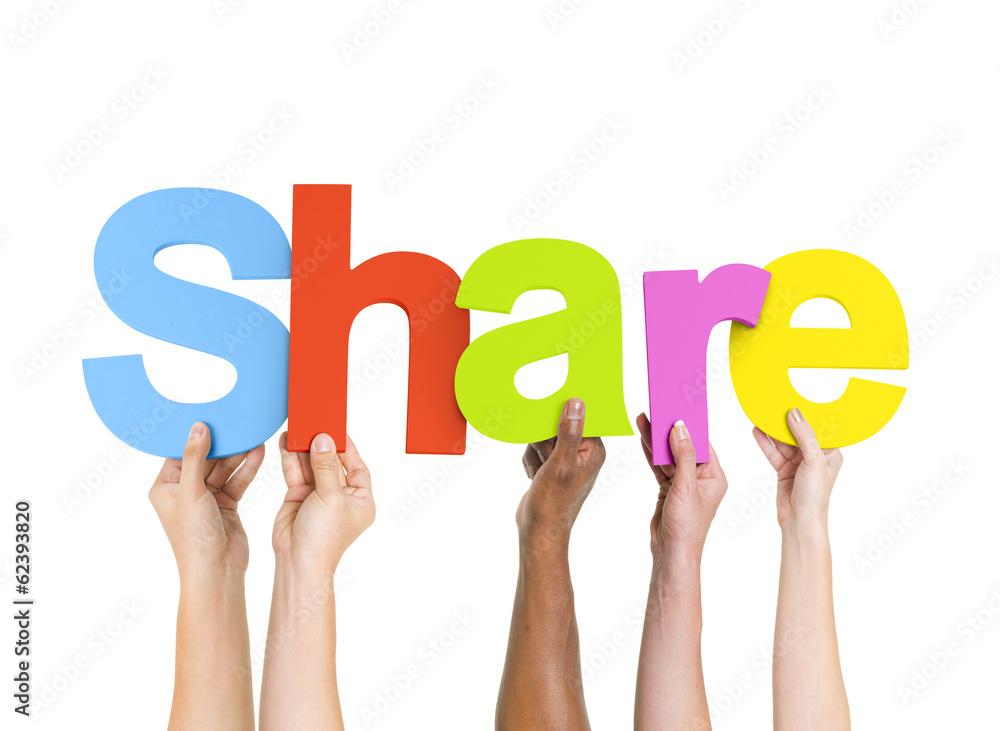 Multi-Ethnic Group of People Holding The Word Share Multi-Ethnic Group of People Holding The Word Share