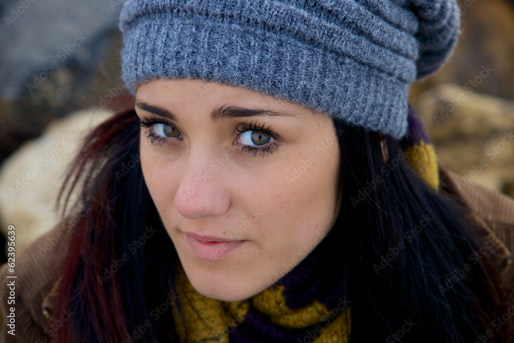Young woman closeup feeling sad with hat Young woman closeup feeling sad with hat