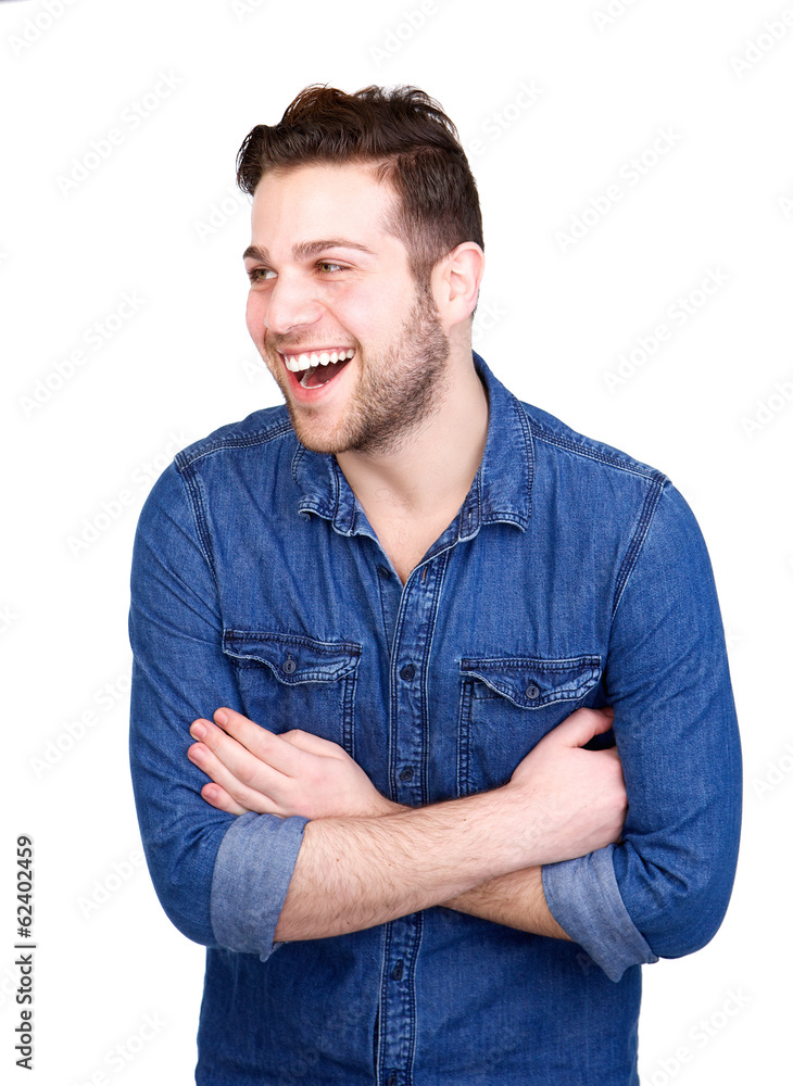 Attractive guy smiling with arms crossed Attractive guy smiling with arms crossed