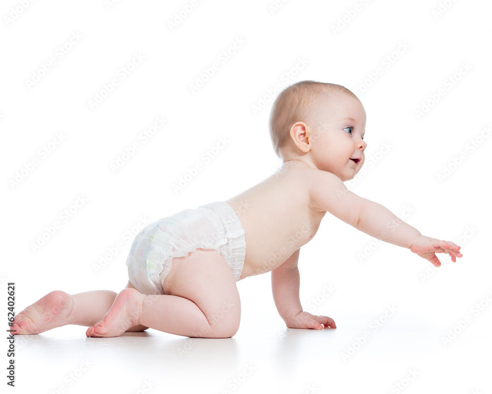 side view of pretty crawling baby girl side view of pretty crawling baby girl