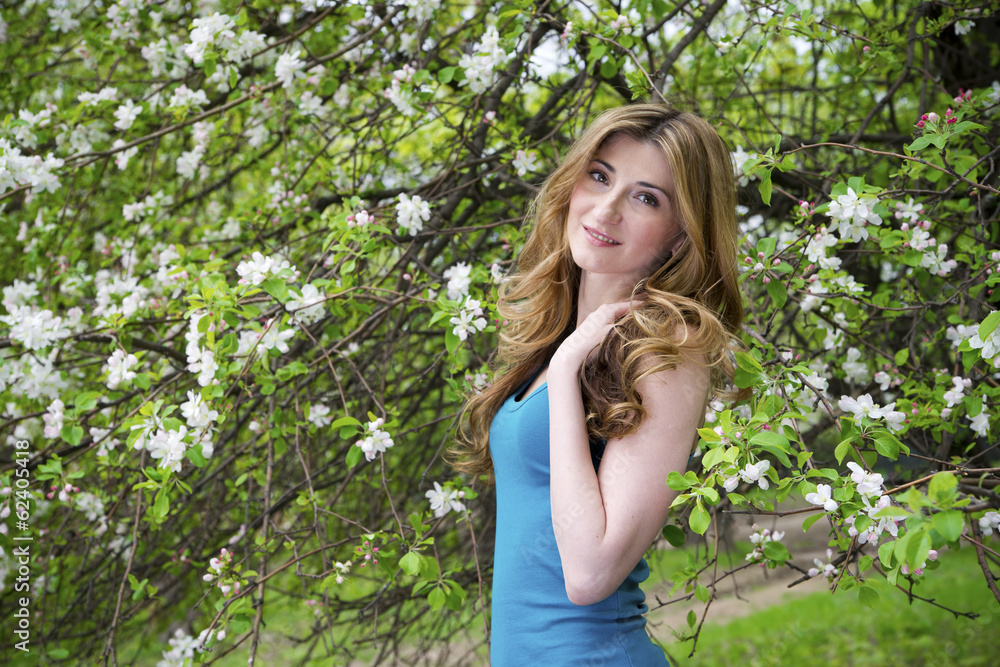 Beautiful woman in garden. Beautiful woman in garden.