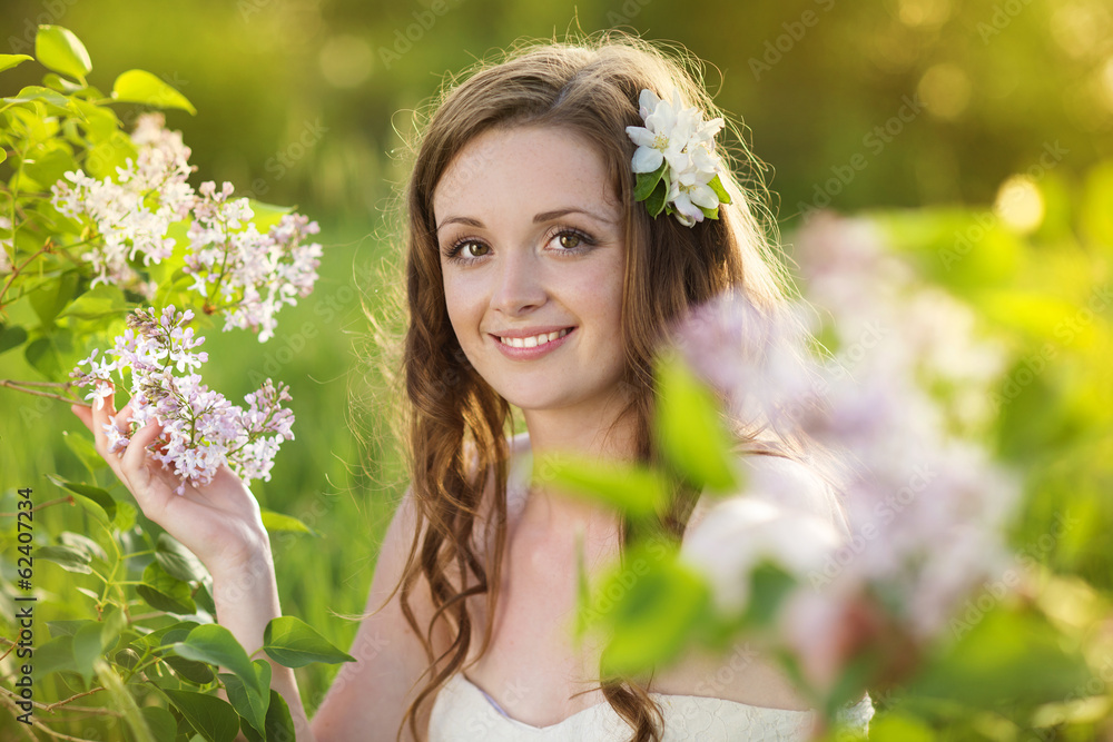Beautiful spring girl with flowers on the meadow Beautiful spring girl with flowers on the meadow