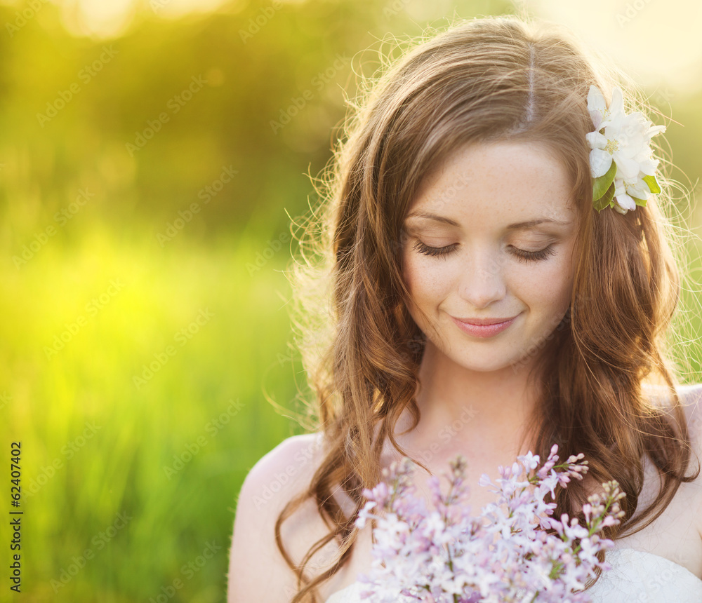 Beautiful spring girl with flowers on the meadow Beautiful spring girl with flowers on the meadow