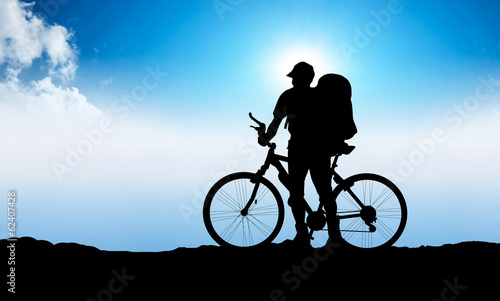 Silhouette of tourist and biker. Active life concept