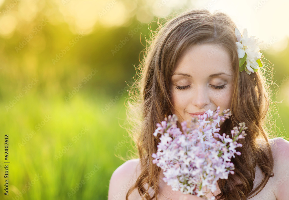 Beautiful spring girl with flowers on the meadow Beautiful spring girl with flowers on the meadow