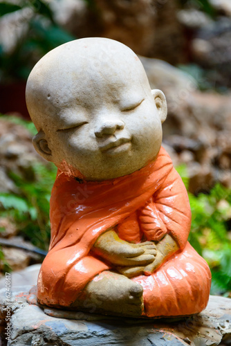 Little buddha sculpture in a temple