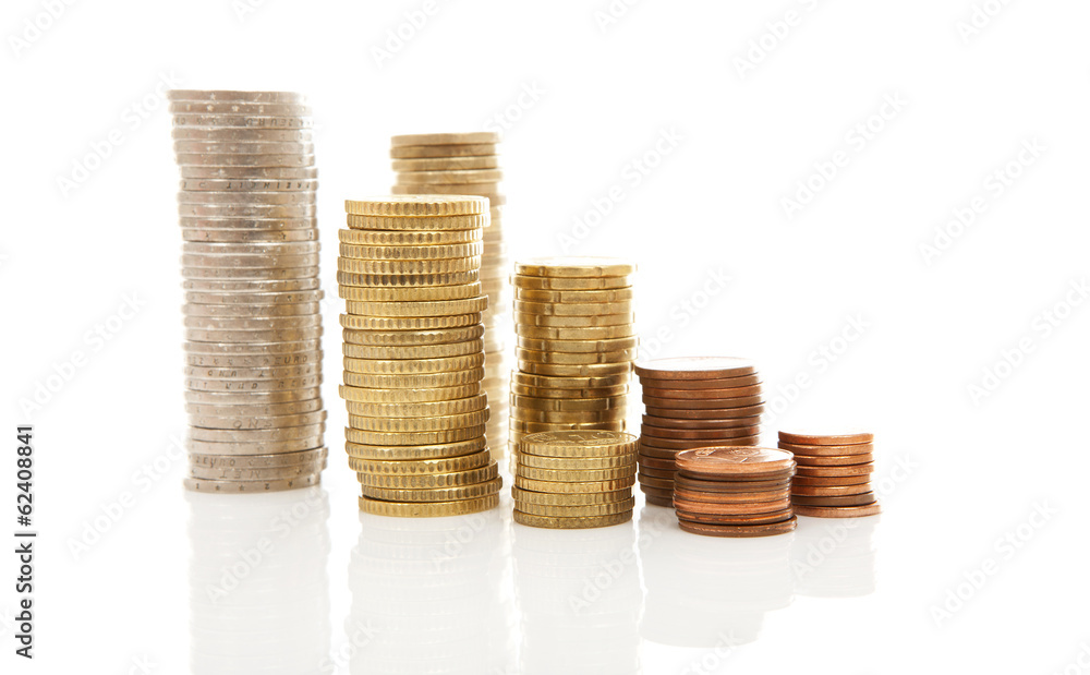 Piles of Euro money coins over white background Piles of Euro money coins over white background