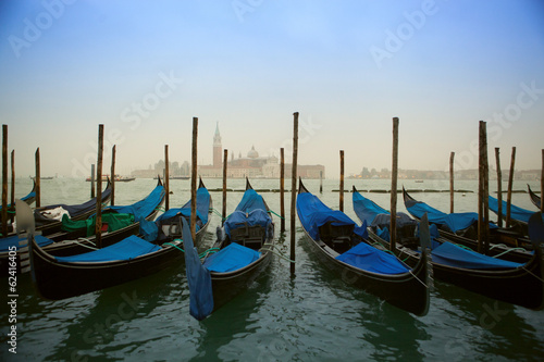 Venice with gondolas on Grand Canal against San Giorgio