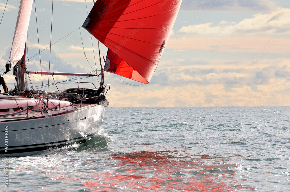 Fototapeta premium red sail at sunset