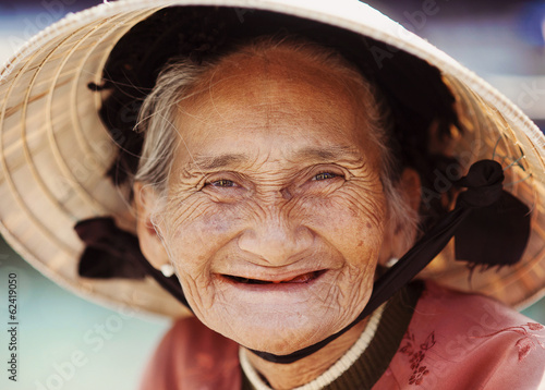 Fototapeta Old and beautiful smiling senior woman.