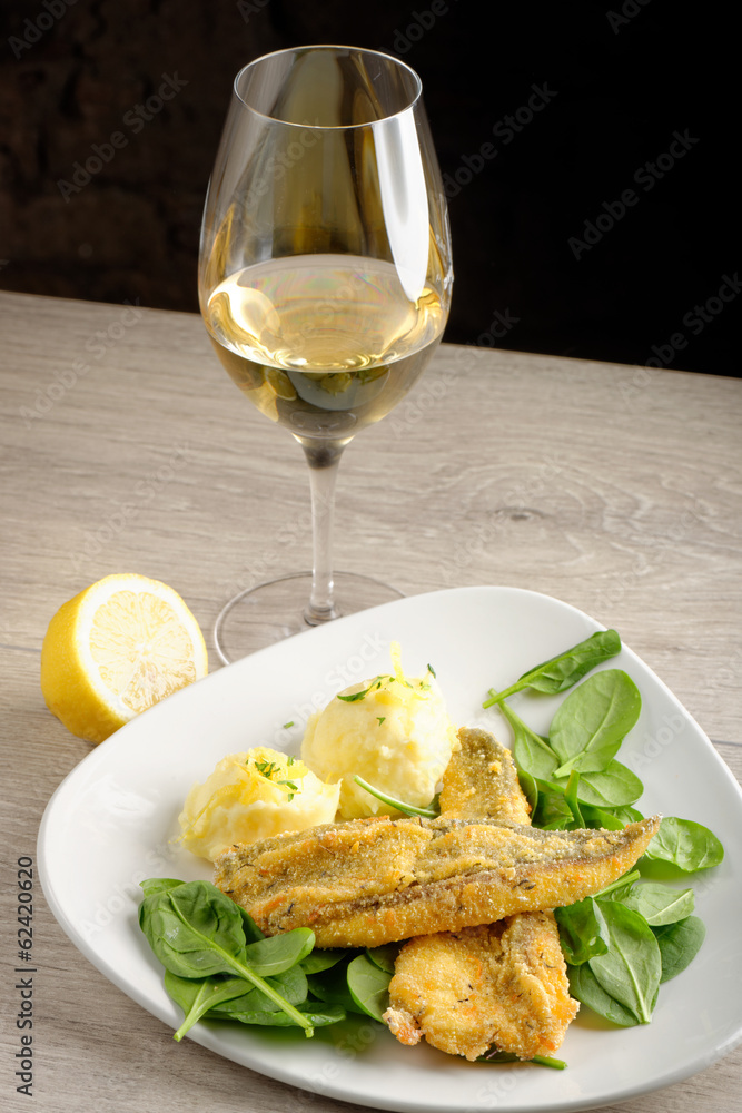 Dinner, Fish fillet with potato, young spinach and white wine Dinner, Fish fillet with potato, young spinach and white wine