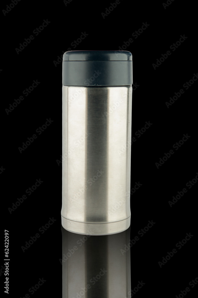 Stainless vacuum bottle on black background Stainless vacuum bottle on black background