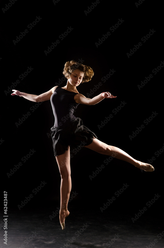 Ballerina on black background