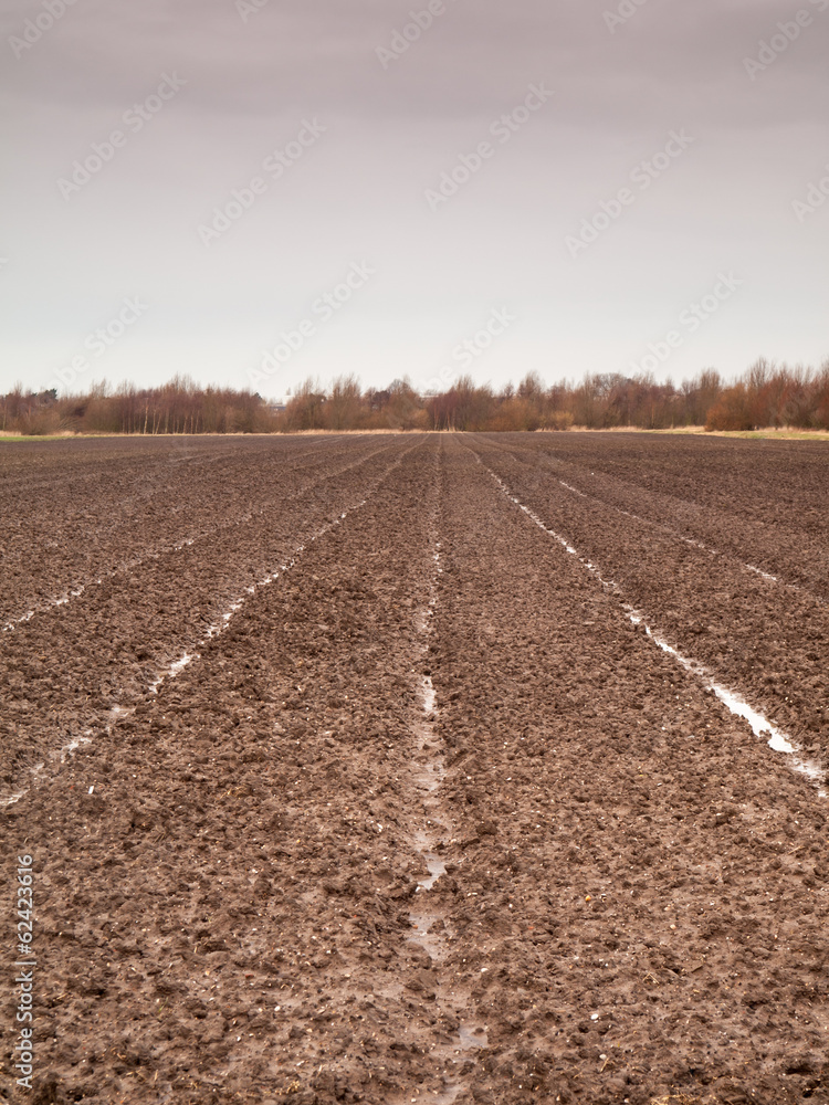 tilled field in winter tilled field in winter