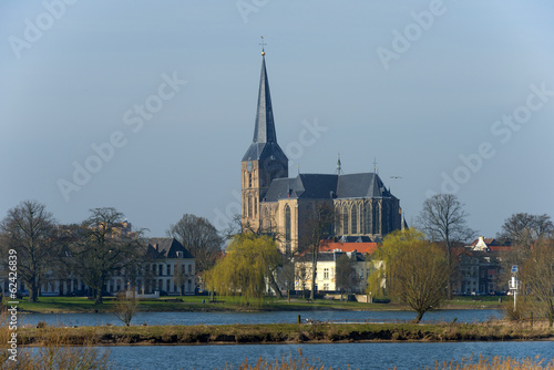 Ancient Gothic church along a river