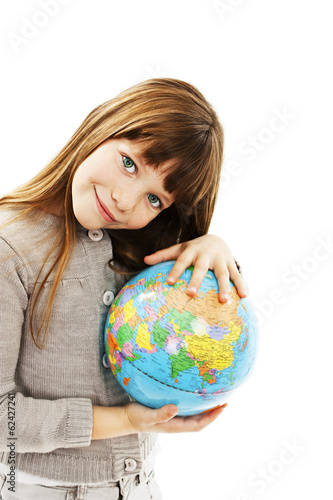 Globe on child hands. Isolated on white background