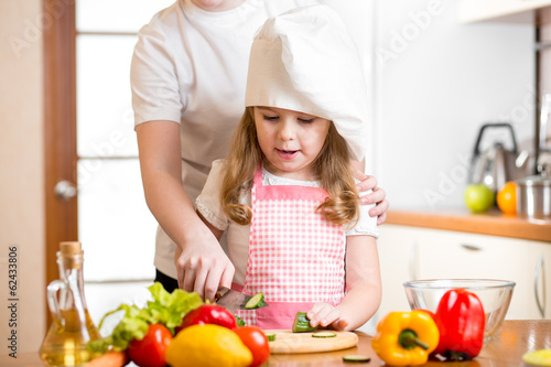 mom and kid preparing healt...