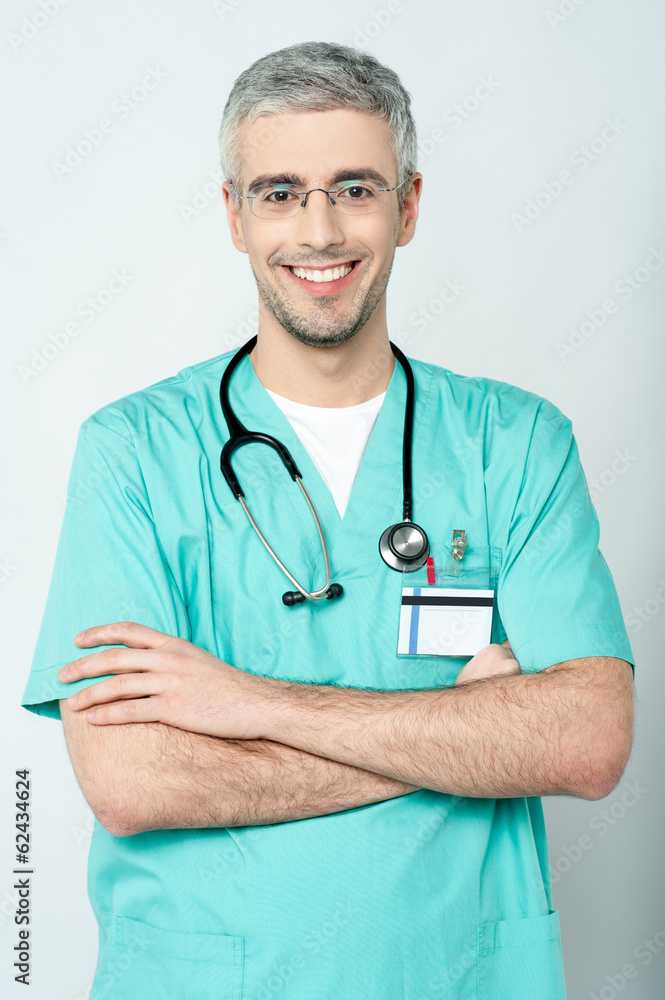 Smiling physician, arms crossed Smiling physician, arms crossed