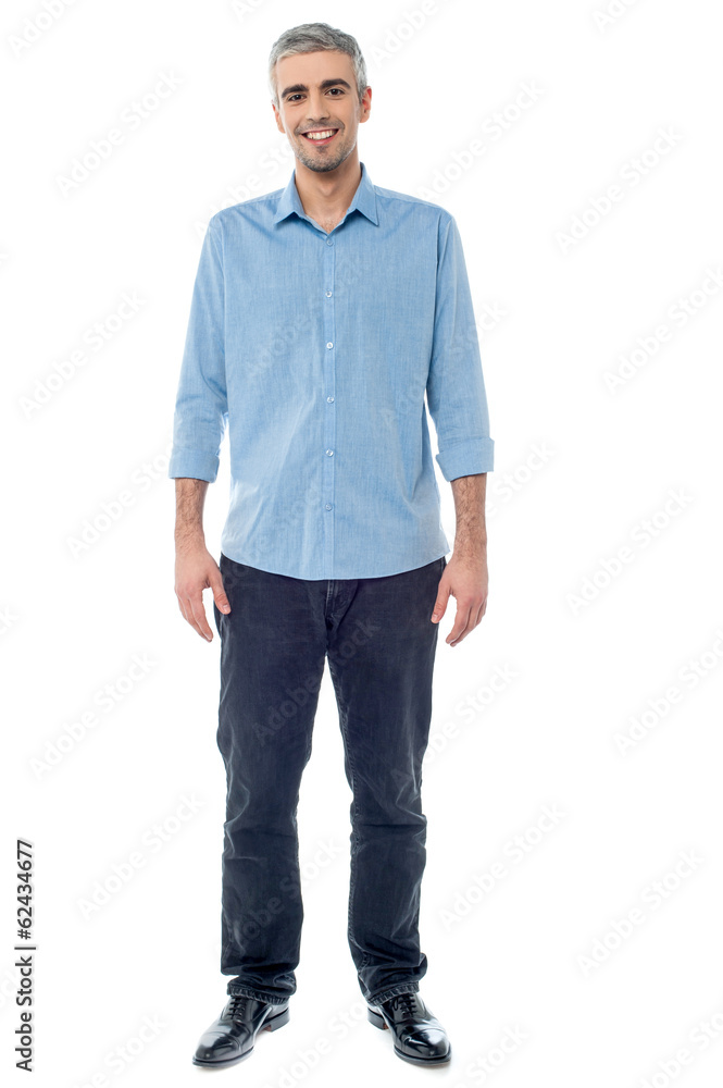 Relaxed middle age man posing casually Relaxed middle age man posing casually