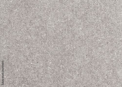 Recycled paper texture closeup background, grey color.