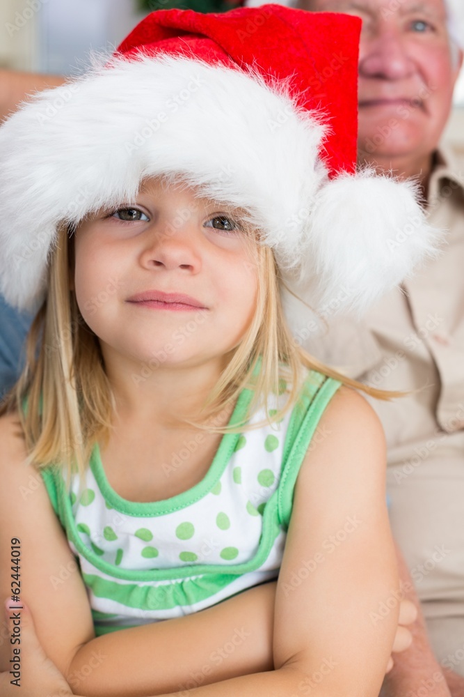 Girl wearing Santa hat at home Girl wearing Santa hat at home