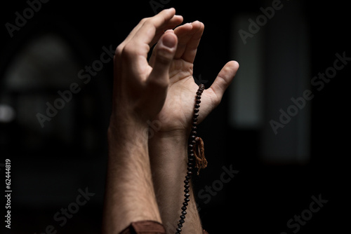 Hands Holding A Muslim Rosary