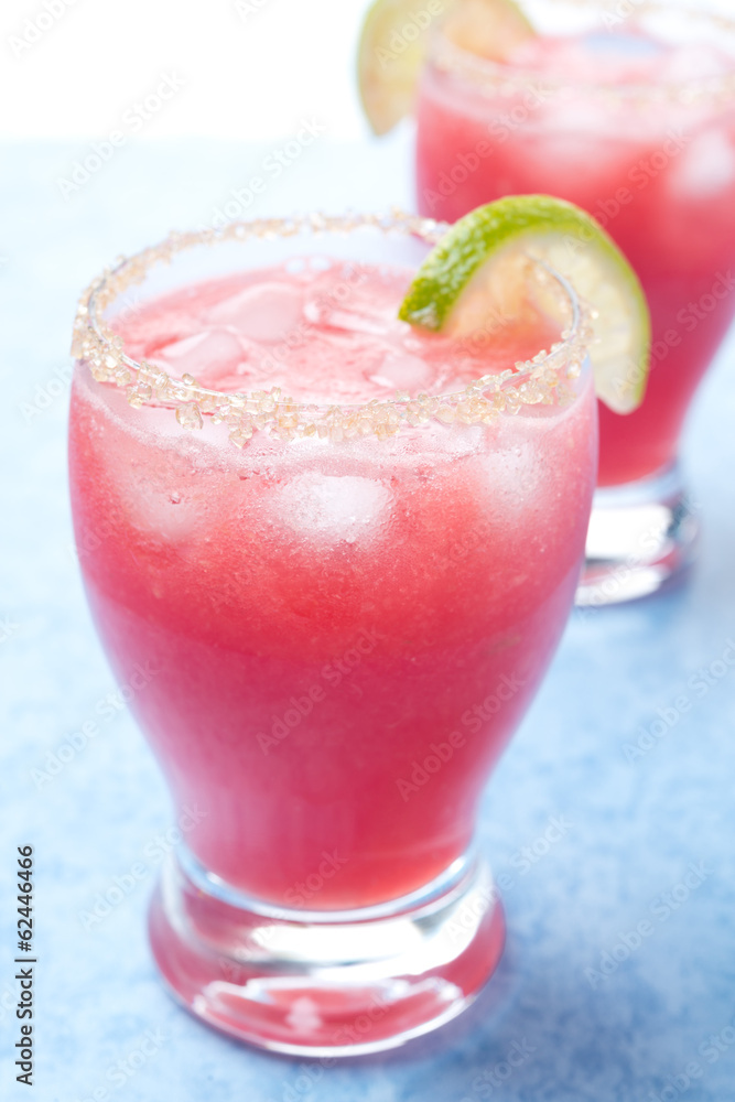 watermelon cocktail with brown sugar and lime in a glass watermelon cocktail with brown sugar and lime in a glass