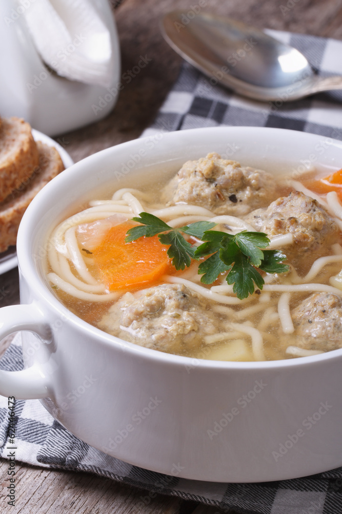 Meatball soup, noodles with vegetables vertical Meatball soup, noodles with vegetables vertical