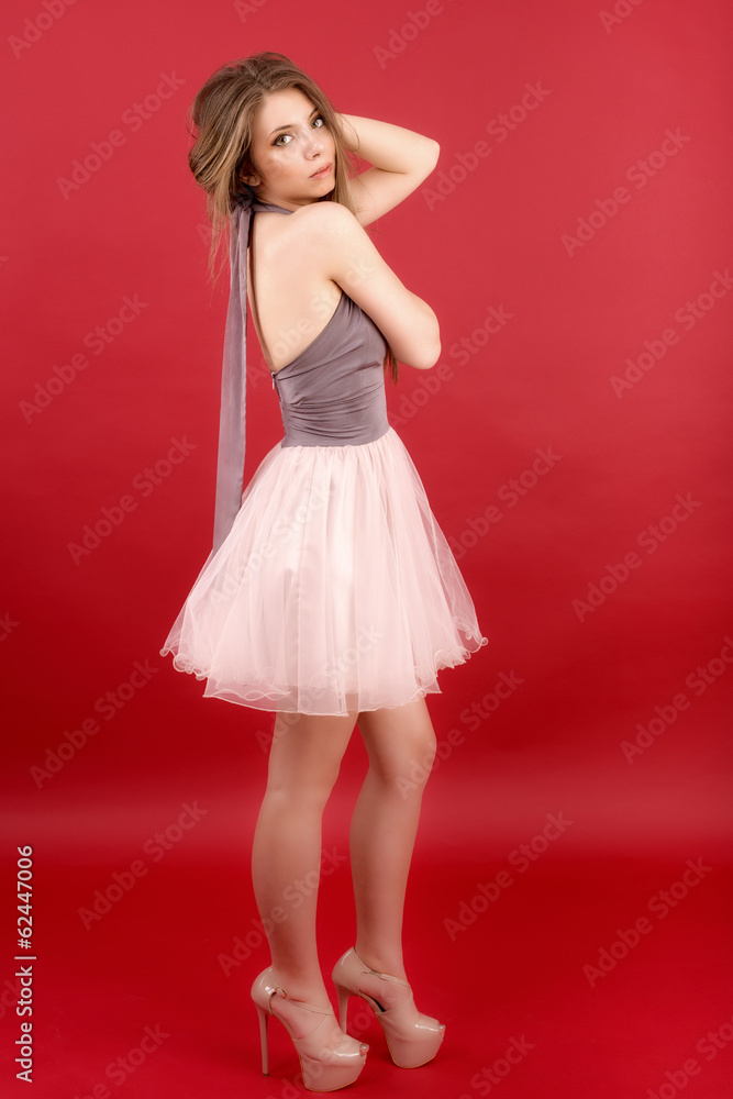 Portrait of beautiful woman on red background Portrait of beautiful woman on red background
