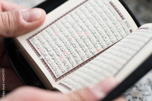 Close-up Muslim Man Reading Koran