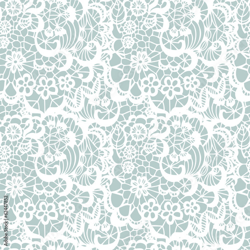 Lace seamless pattern with flowers on blue background