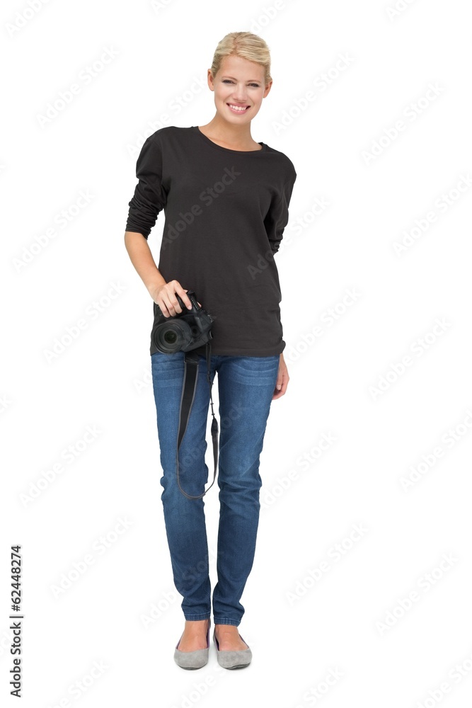 Full length portrait of a female photographer Full length portrait of a female photographer