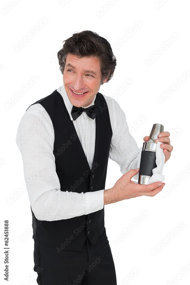 Bartender using cocktail shaker over white background Bartender using cocktail shaker over white background