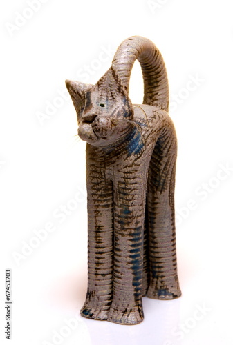 Cat figurine on white background