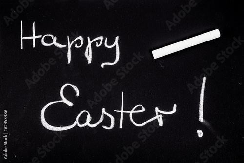 Chalk letters on black paper for easter.