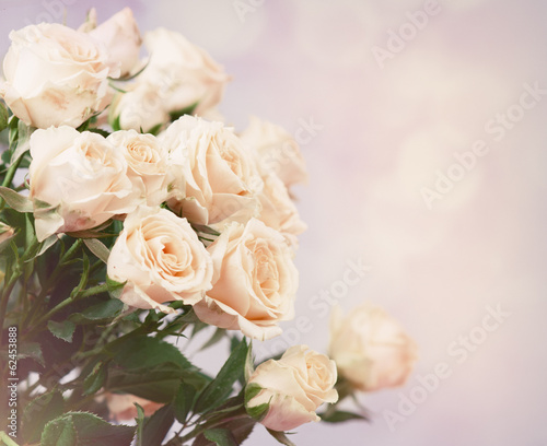 Pink roses bouquet with free space for text © Elena Kharichkina
