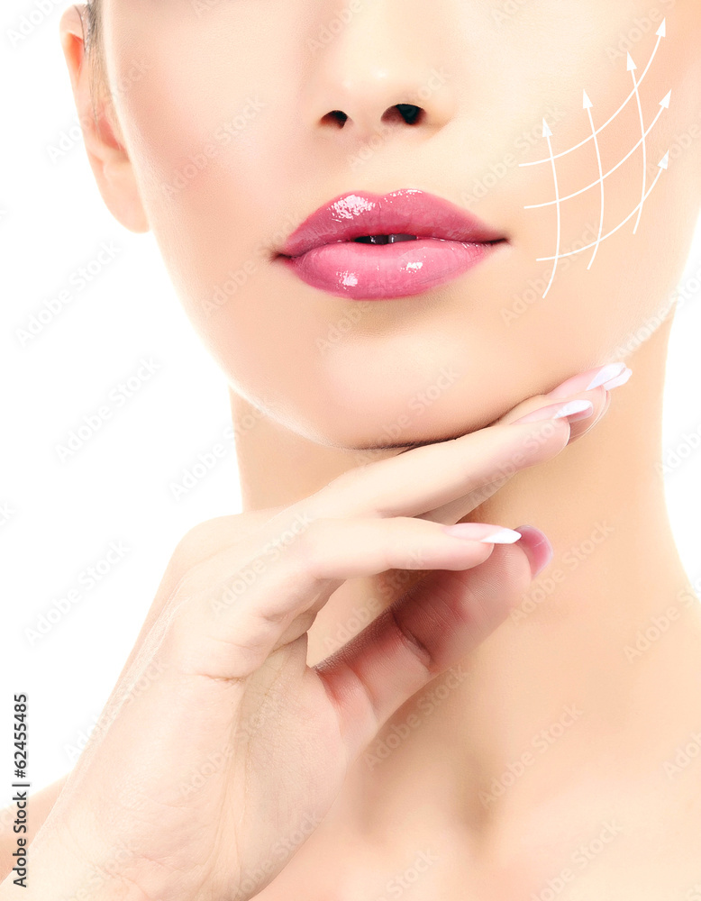 Young female with clean fresh skin, white background Young female with clean fresh skin, white background