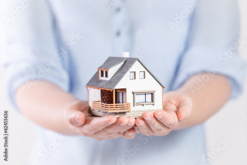 House in woman's hands