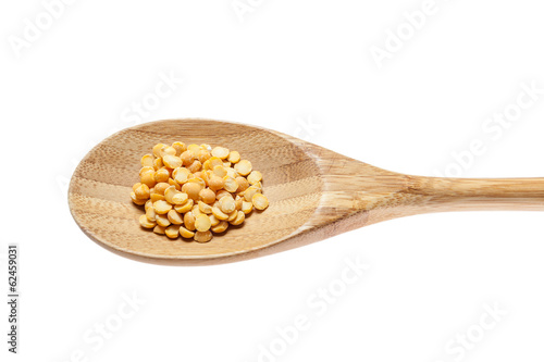 Yellow peas grain and spoon
