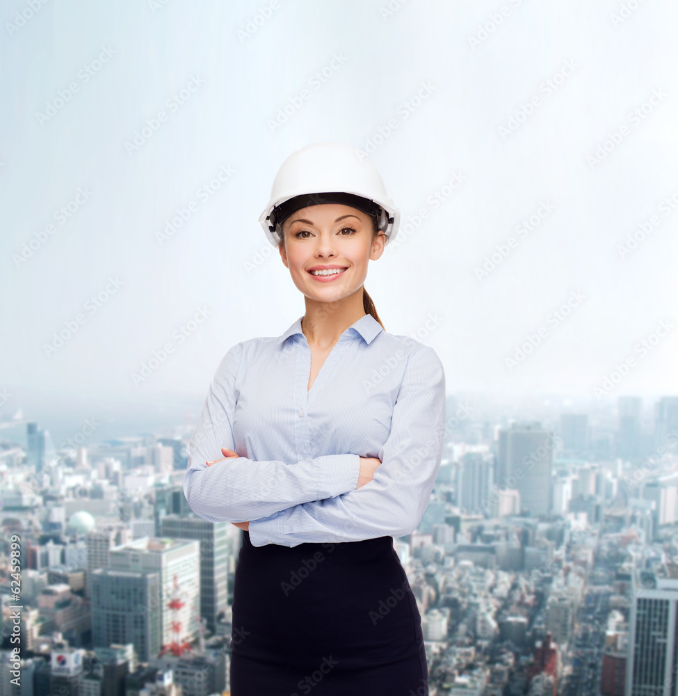 friendly smiling businesswoman in white helmet friendly smiling businesswoman in white helmet